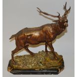 CHARLES VALTON (1851-1918) FRENCH A BRONZE STANDING ROARING STAG on a naturalistic base. Signed C.