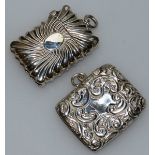 TWO VICTORIAN SILVER REPOUSSE DECORATED VESTAS. Chester 1898 and Birmingham 1897.