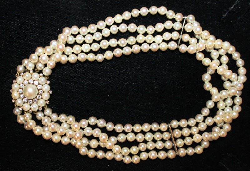 A SUPERB FOUR ROW PEARL CHOKER with 18ct yellow gold, pearl and diamond clasp, set with twelve