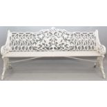 A VERY GOOD WHITE PAINTED CAST IRON FOUR SEATER GARDEN BENCH, the back and arms with fruiting