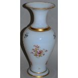 A 19TH CENTURY OPALINE GLASS VASE painted with flowers and gilded 11.5ins high.