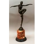 AFTER J. PHILLIP AN ART DECO BRONZE DANCER. Signed, on a marble column 23ins high.