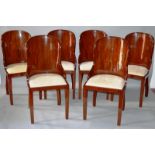A GOOD SET OF SIX ART DECO DESIGN DINING CHAIRS with curving backs, drop in seats and tapering front