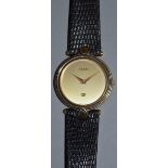 A GENTLEMAN’S 14CT GOLD PLATED GUCCI WRISTWATCH and strap.