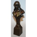 GIOVANNI SCHOEMAN (1940-1980) SOUTH AFRICAN AN ART NOUVEAU BRONZE BUST OF A YOUNG LADY “ETHNE”.