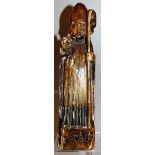 AN EARLY POST 17TH CENTURY CARVED WOOD AND POLYCHROME SAINT “ST AUBERT” 11ins high.