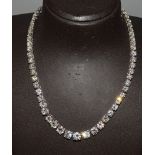 A SUPERB DIAMOND NECKLACE, approx. 26cts, set in PLATINUM with sixty-eight diamonds.
