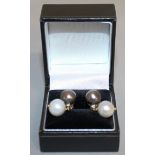 A PAIR OF BLACK AND WHITE PEARLS AND DIAMOND DROP EARRINGS.