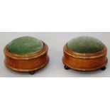 A PAIR OF UNUSUAL VICTORIAN MAHOGANY CIRCULAR SPITTOONS with padded velvet rising tops and paisley