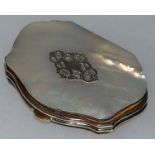 A SHAPED MOTHER-OF-PEARL PURSE.