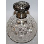 A VICTORIAN CUT GLASS SCENT BOTTLE with silver band and stopper. London 1885.