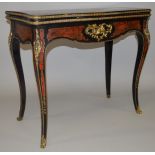 A GOOD 19TH CENTURY “BOULLE” FOLD-OVER CARD TABLE of serpentine outline, concertina action, with