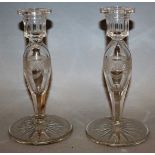 A PAIR OF CUT GLASS CANDLESTICKS 8ins high.