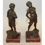 CARL KAUBA (1865-1922) AUSTRIAN/AMERICAN A GOOD PAIR OF BRONZE FIGURES OF YOUNG BOYS in a defiant