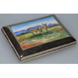 A GEORGE V SILVER AND ENAMEL MATCHBOX HOLDER “THE CAPE”, two springbok in a landscape ……… Sir