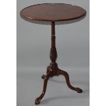 A GEORGIAN STYLE MAHOGANY CIRCULAR TRAY TOP TRIPOD TABLE with fluted column legs ending in claw