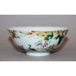 A GOOD QUALITY CHINESE FAMILLE ROSE PORCELAIN BOWL, the sides decorated with a garden scene and with