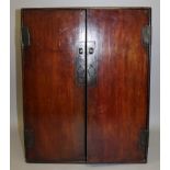 A 19TH/20TH CENTURY CHINESE HARDWOOD TABLE CABINET, the two front doors opening to reveal two
