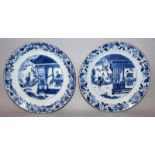 A PAIR OF EARLY 18TH CENTURY CHINESE KANGXI PERIOD BLUE & WHITE PORCELAIN DISHES, each painted to