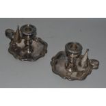 A PAIR OF OLD SHEFFIELD PLATE CHAMBER CANDLESTICKS.