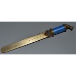 A RUSSIAN SILVER GILT AND BLUE ENAMEL PAPERKNIFE, the top with a cast dog and diamond in a FABERGE