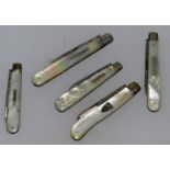 FIVE VARIOUS SILVER AND MOTHER-OF-PEARL FRUIT KNIVES.