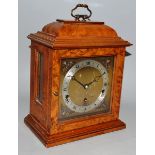 A GOOD ELLIOTT WALNUT CASED BRACKET CLOCK, eight day lever, Westminster and Whittington chimes,