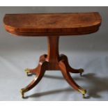 A GOOD REGENCY BURR ELM ROSEWOOD CROSSBANDED CARD TABLE with folding top and green baize interior,