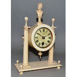 A VERY UNUSUAL 19TH CENTURY FRENCH IVORY DRUM CLOCK, supported between two columns with devil