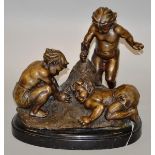 A GOOD BRONZE OF THREE PLAYFUL CUPIDS on a marble base 13ins high.