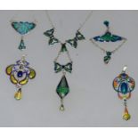 FIVE VARIOUS SILVER AND ENAMEL PENDANTS.