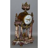 A 19TH CENTURY RED VEINED MARBLE AND ORMOLU COLUMN CLOCK, with eight day drum movement by J.