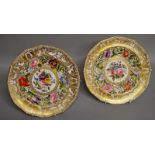 A FINE PAIR OF 19TH CENTURY DERBY SAMPSON HANCOCK PLATES, painted lavishly with flowers and gold,