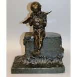 A SUPERB 1920’S BRONZE FIGURE OF A YOUNG BOY sitting on a wave lashed seawall and holding a duck.