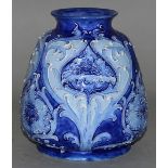 A MOORCROFT FLORIAN WARE “BLUE POPPY” VASE, 6ins high, incised WM des, No. M755 in blue and