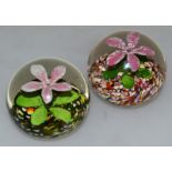 TWO SIMILAR FLOWER PAPERWEIGHTS. 2.75ins diameter.