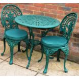 A PAIR OF GREEN PAINTED CAST ALUMINIUM SMALL PATIO TABLES; together with six chairs, two