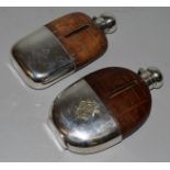 TWO LEATHER MOUNTED WHISKY FLASKS.