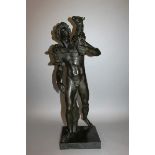 AFTER THE ANTIQUE – GIAN DA BOLOGNA A FINE BRONZE OF A BOY, A COAT OVER HIS SHOULDER, standing on