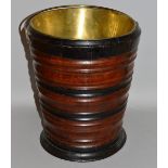 A DUTCH WOODEN BUCKET with brass liner and handle 13.5ins high.