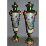 A GOOD PAIR OF LOUIS XVI DESIGN GREEN “SEVRES” PORCELAIN VASES AND COVERS with reverse decorated