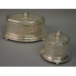 A PERSIAN DESIGN CIRCULAR BISCUIT BOX AND A JEWELLERY BOX.