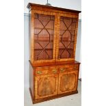 A GEORGE III MAHOGANY SECRETAIRE BOOKCASE, with a moulded cornice over a pair of astragal glazed