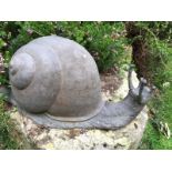 A FAUX LEAD MODEL OF A SNAIL. 1ft 5ins long.