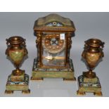 A GOOD 19TH CENTURY FRENCH CHAMPLEVE ENAMEL, ORMOLU AND GREEN ONYX THREE PIECE CLOCK GARNITURE