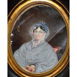 A VICTORIAN OVAL FRAMED PORTRAIT MINIATURE OF AN OLD LADY 3.5ins x 2.5ins.