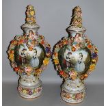 A LARGE PAIR OF MEISSEN DESIGN PORCELAIN VASES, COVERS AND STANDS painted with figures and encrusted