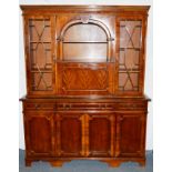 A GEORGIAN STYLE YEW WOOD BOOKCASE, the top with open shelf, fall flap with a pair of astragal doors