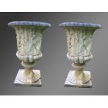 A VERY GOOD PAIR OF RECONSTITUTED STONE URNS OF CAMPAGNA FORM, decorated with classical Greek