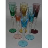 A HARLEQUIN SET OF SIX COCKTAIL GLASSES.